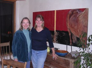 Penlope (l) and Leta (r) in front of one of Susan Hertel's paintings